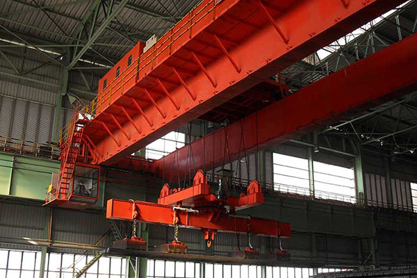 https://www.kostacrane.com/wp-content/uploads/2024/09/Double-Girder-Overhead-Crane-with-electromagnet-5.jpg